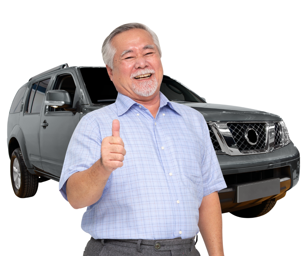 Smiling older man in a light blue shirt giving a thumbs up in front of a gray SUV.